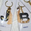 Personalized Alphabet Resin Keychain – Floral Gold Series