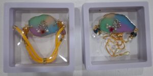 Rakhi cum Bracelet – Petal-Shaped Ganesha Charm
