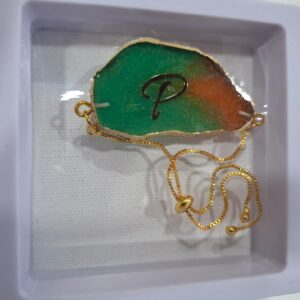 Rakhi cum Bracelet – Green-Orange “P” Initial Resin Charm