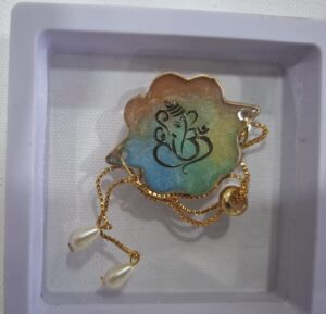 Rakhi cum Bracelet – Yellow-Green Ganesha with Gold Chain